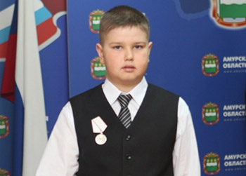 Школьника из Октябрьского района наградили медалью 